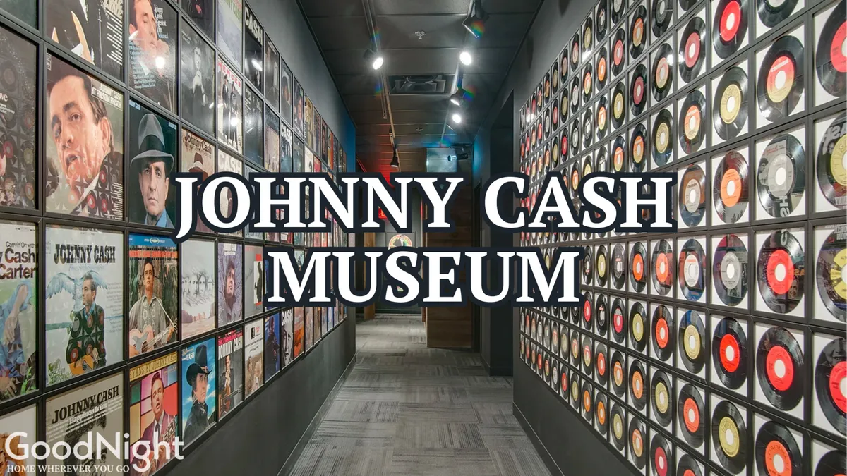 An interior view of a music-themed exhibition space featuring a wall of album covers, Johnny Cash memorabilia, and engaging displays, inviting guests to explore Nashville’s rich musical legacy.